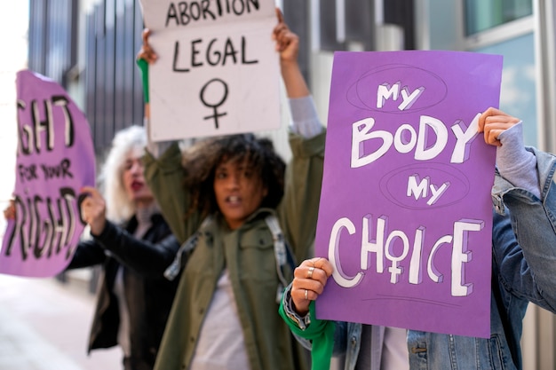 Front view women protesting outdoors