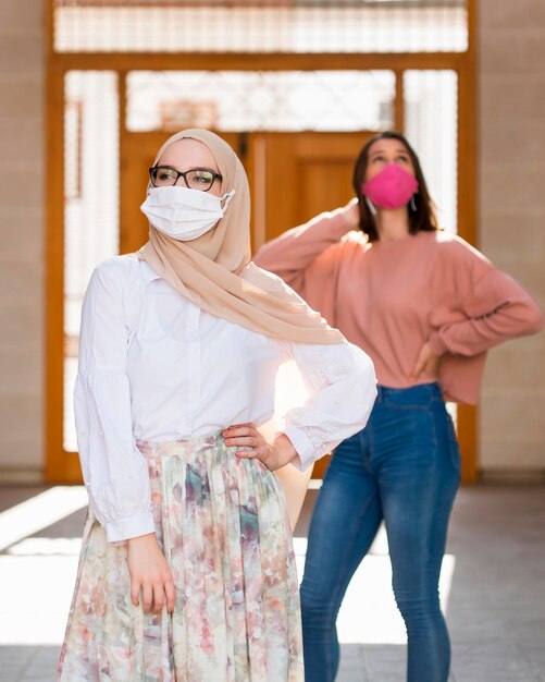 Front view women wearing masks