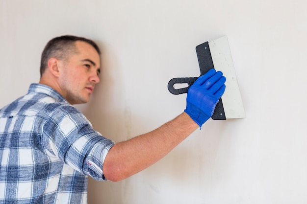 Front view of worker with a trowel