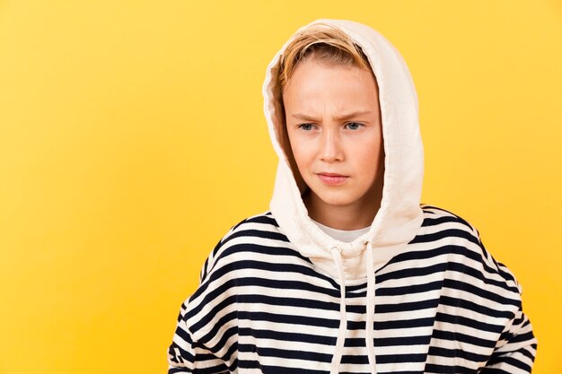 Front view young boy wearing hoodie