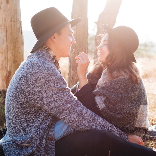 Free Photo front view young couple in the nature