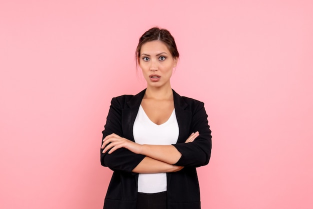 Free Photo front view young female in dark jacket on pink background