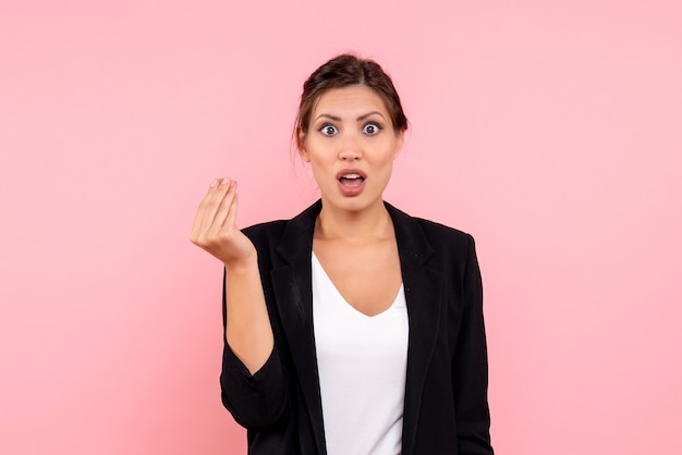 Free Photo front view young female in dark jacket on pink background