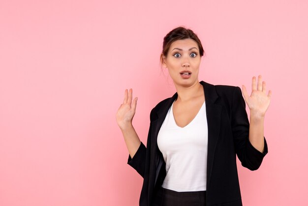 Free Photo front view young female in dark jacket on pink background