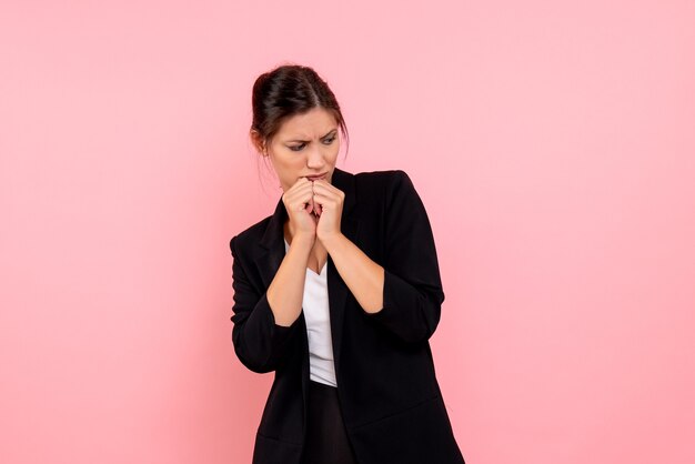 Front view young female in dark jacket on pink background