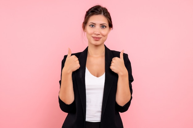 Free Photo front view young female in dark jacket on pink background