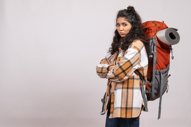 Front view young female going in hiking with backpack on white background campus tourist vacation mountain trip forest