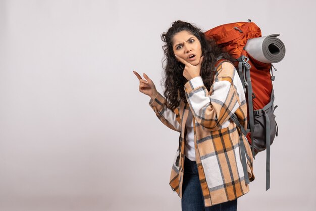 Front view young female going in hiking with backpack on a white background forest trip vacation mountain air tourist campus