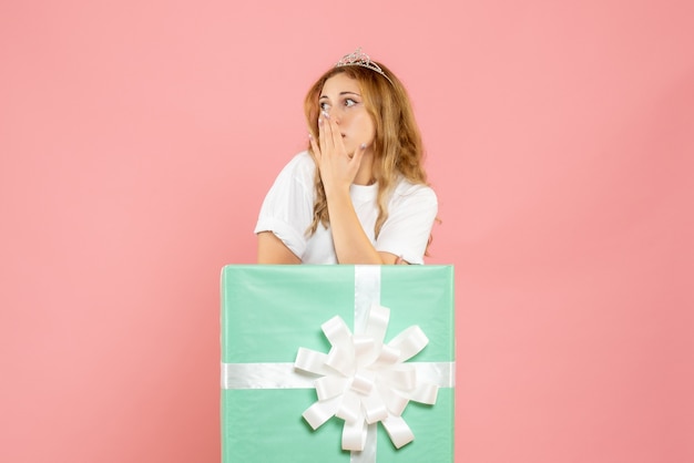 Free photo front view young female inside blue present box