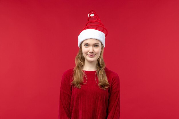 Free Photo front view young female preparing for christmas, holidays red christmas