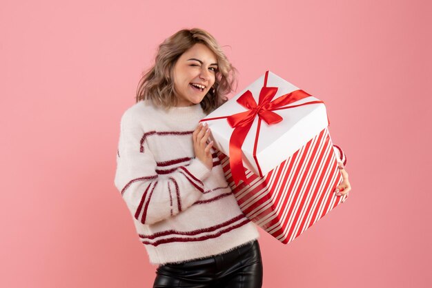 Front view young female with xmas present