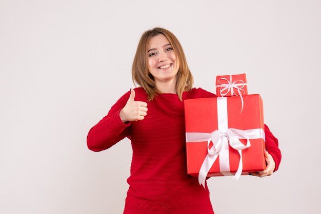 Front view young female with xmas presents