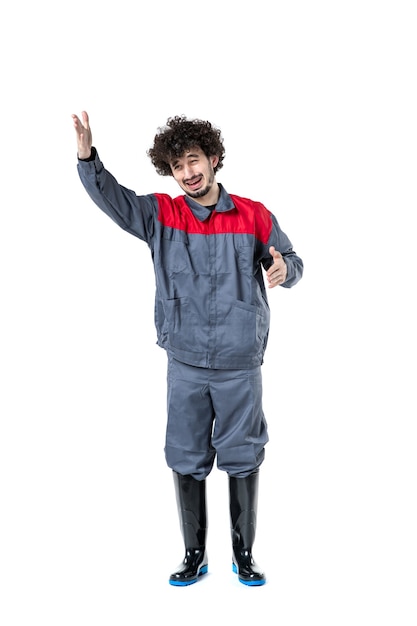 Free photo front view young male worker in uniform on white background