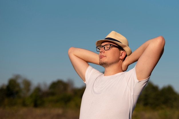 Free photo front view of a young man relaxing