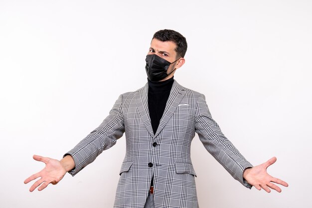 Free Photo front view young man with black mask opening hands standing on white isolated background