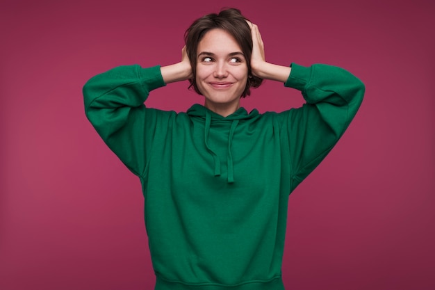 Free Photo front view of a young woman covering her ears