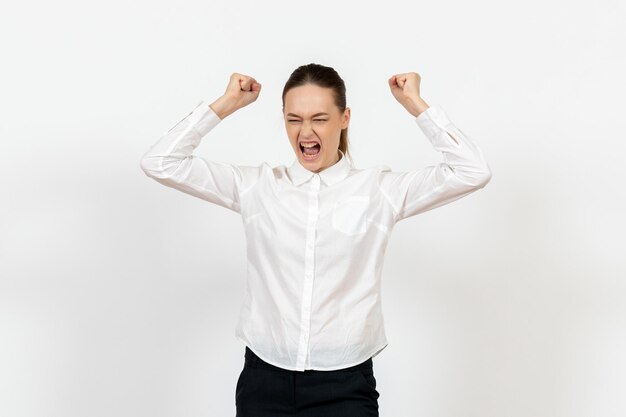 Front view young woman in white blouse angrily throwing files on white background female emotions feelings office job