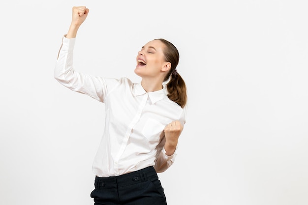 Front view young woman in white blouse with delighted expression on a white background female job office emotion feeling model