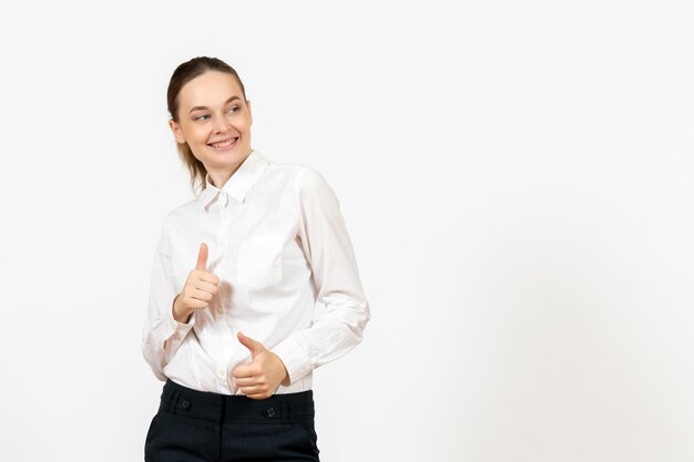 Front view young woman in white blouse with smiling face on white background job female feeling model emotion office