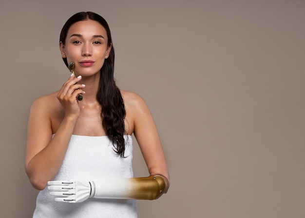 Free photo front view young woman with prosthesis