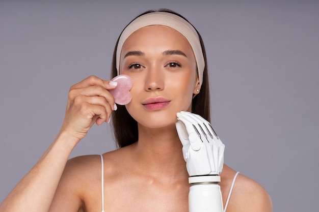 Free photo front view young woman with prosthetis