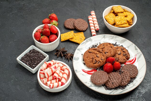 Front view yummy choco biscuits with different snacks