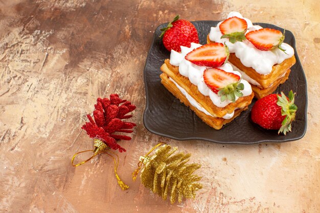 Front view yummy creamy cakes with fruits on a light background