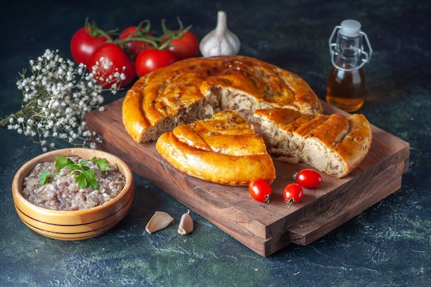 Free Photo front view yummy meat pie with greens and tomatoes on dark background biscuit cake food pastry bake dough color pie oven meal