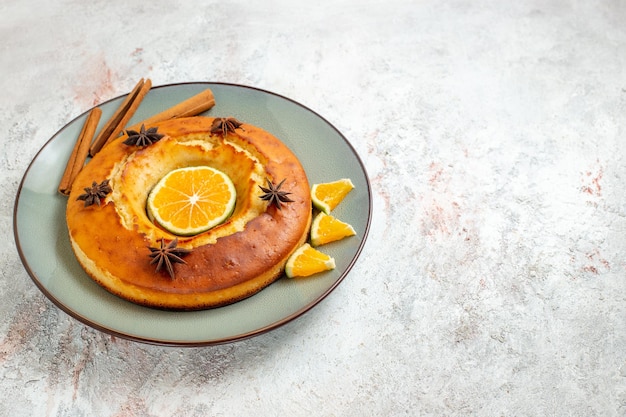 Front view yummy pie delicious dessert for tea with orange slices on white background fruit cake pie tea biscuit sweet dessert