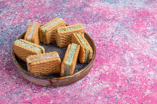 Front view of yummy waffle cookies inside plate