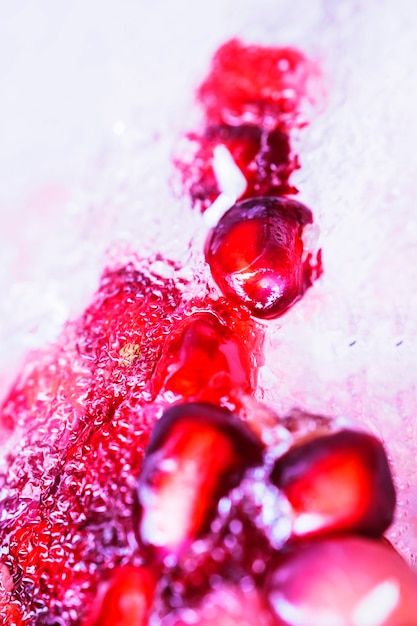 Free photo frozen pomegranate seeds