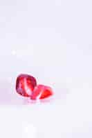 Free photo frozen pomegranate seeds