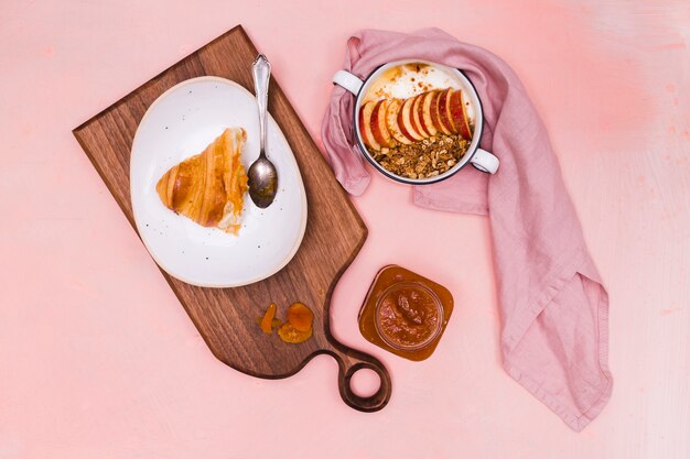 Fruit bowl and croissant top view