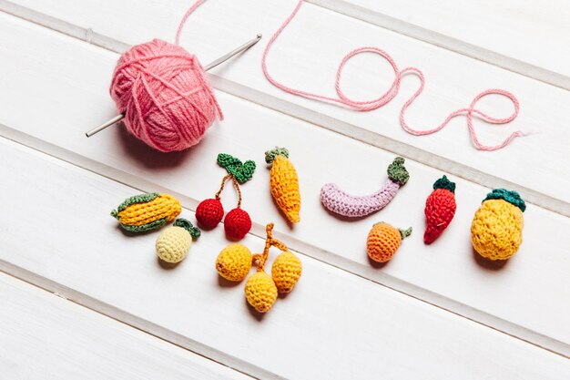 Free photo fruit and knitting concept