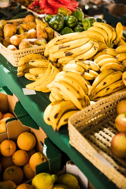 Free Photo fruit market with various colorful fresh fruits and vegetables