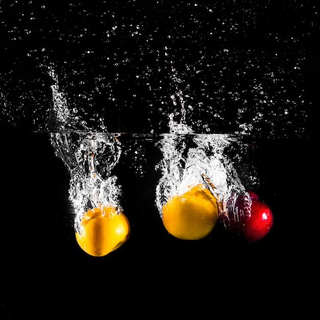 Fruit plunging into the water