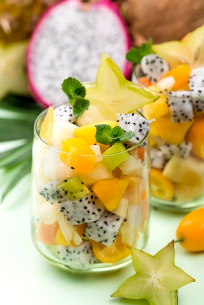 Free Photo fruit salad in glass and yogurt