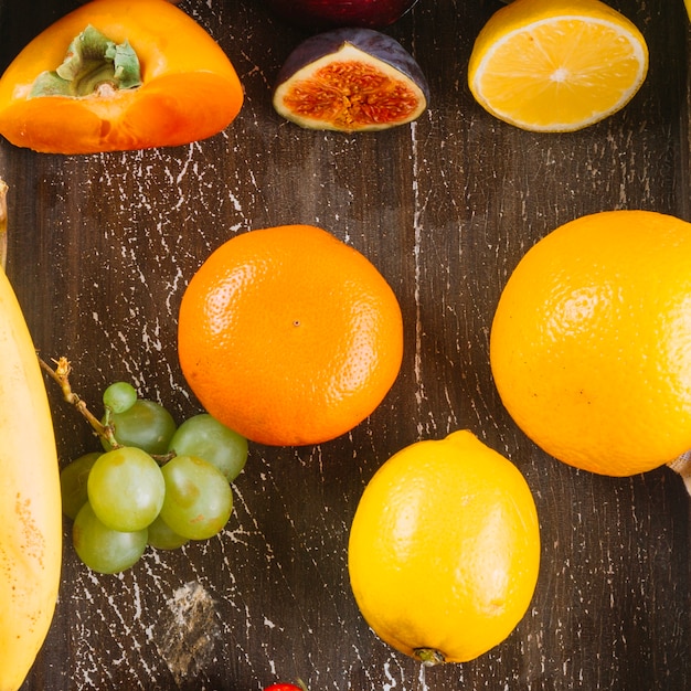 Fruits on wooden background