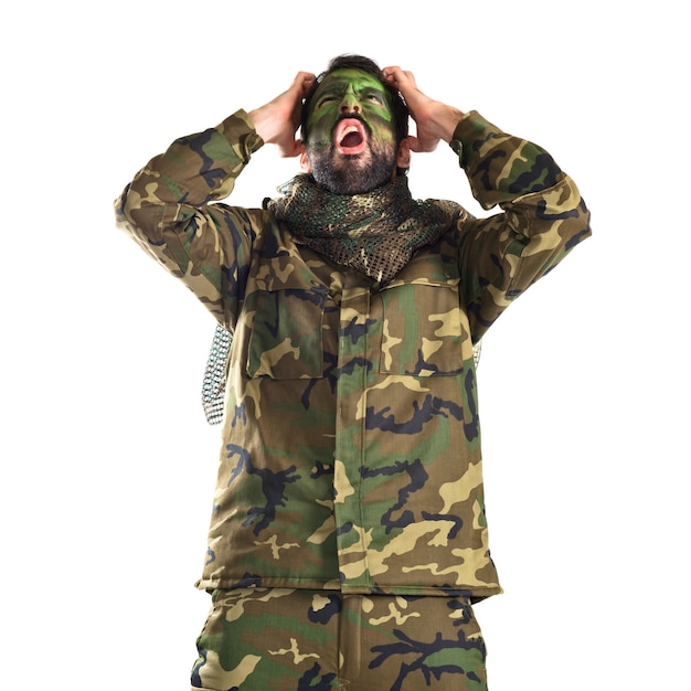 Free photo frustrated soldier over white background