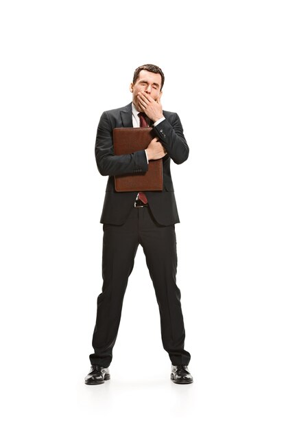 Full body portrait of businessman with folder on white