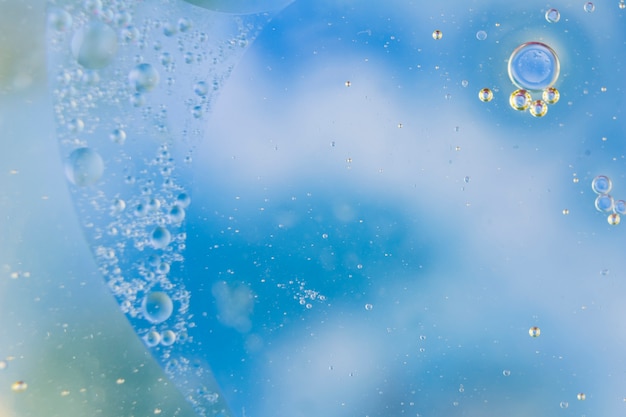 Free photo full frame of blue background with bubbles