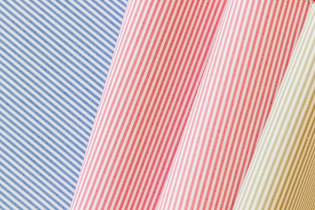 Full frame of colorful striped pattern folded fabric