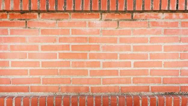 Free photo full frame of red brick wall