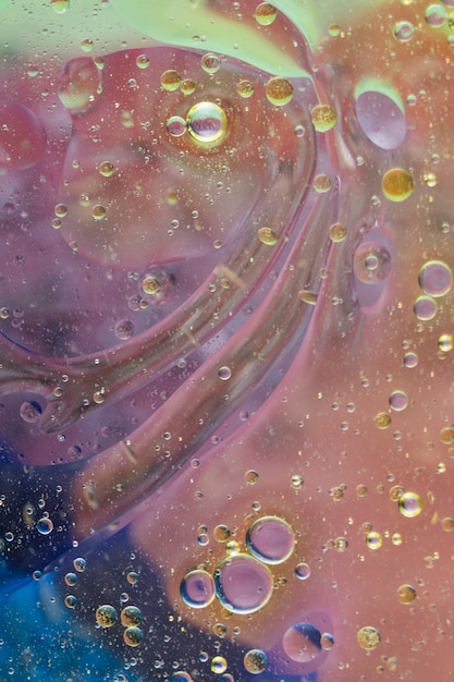 Full frame shot of colorful background with floating oil drops