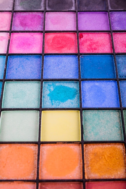 Free photo full frame shot of palette with multi colored eye shadow powder