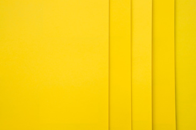 Full frame shot of yellow cardboard papers