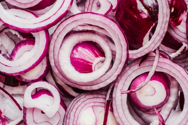 Full frame of sliced red onion rings