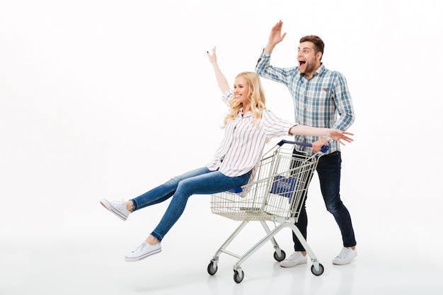 Full length portrait of a cheerful couple