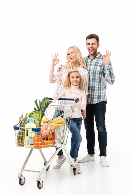 Full length portrait of a smiling family