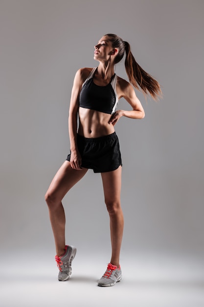 Full length portrait of a young healthy fitness woman